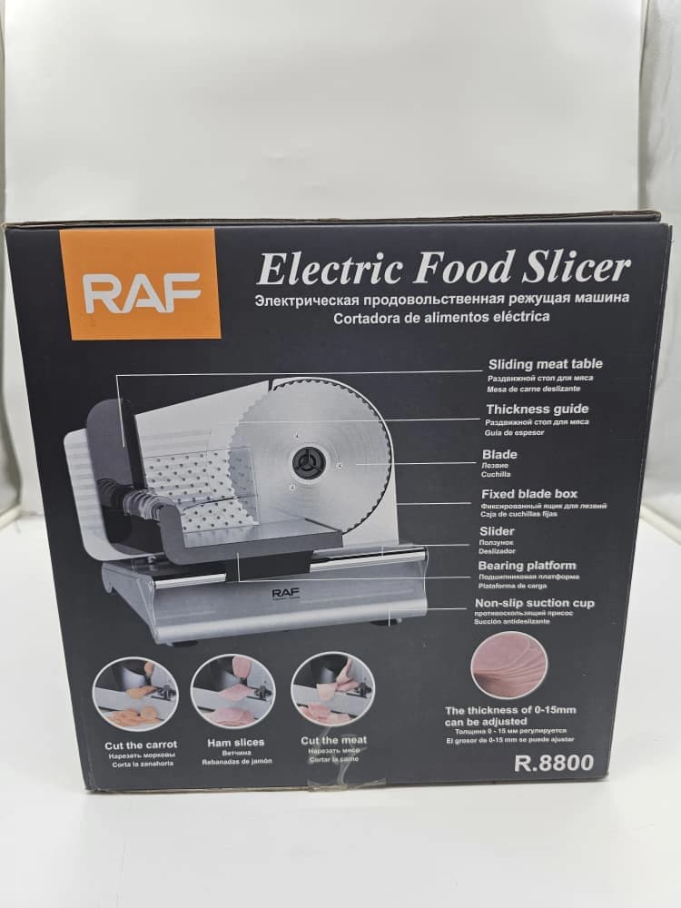 Trancheuse électrique RAF modèle R.8800, conçue pour trancher la viande, le jambon et les légumes